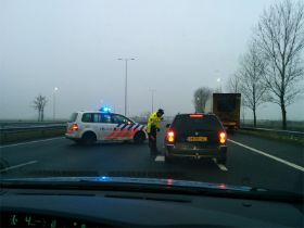 09_De politie midden op de snelweg.jpg